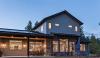 Awnings, overhangs, and porches shield windows and doors from sun, rain, and snow in this sunny mountain locale.