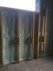 The double walls form a 12-inch cavity that was sheathed with a coated OSB then coated with 3 inches of closed-cell spray foam; they will be filled with 9 inches of blown fiberglass.  