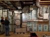 Right - The precast insulated concrete walls of the basement provide a conditioned space for the high-efficiency (18 SEER, 9.5 HSPF) air-source heat pump, with its variable-speed fan, five-stage compressor, and MERV 11 filter.