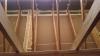 In the attic, all of the top plate seams are sealed with canned spray foam before covering the ceiling deck with blown fiberglass.